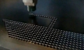 Dya-star CNC-410 is punnching a ship shape on the metal plate